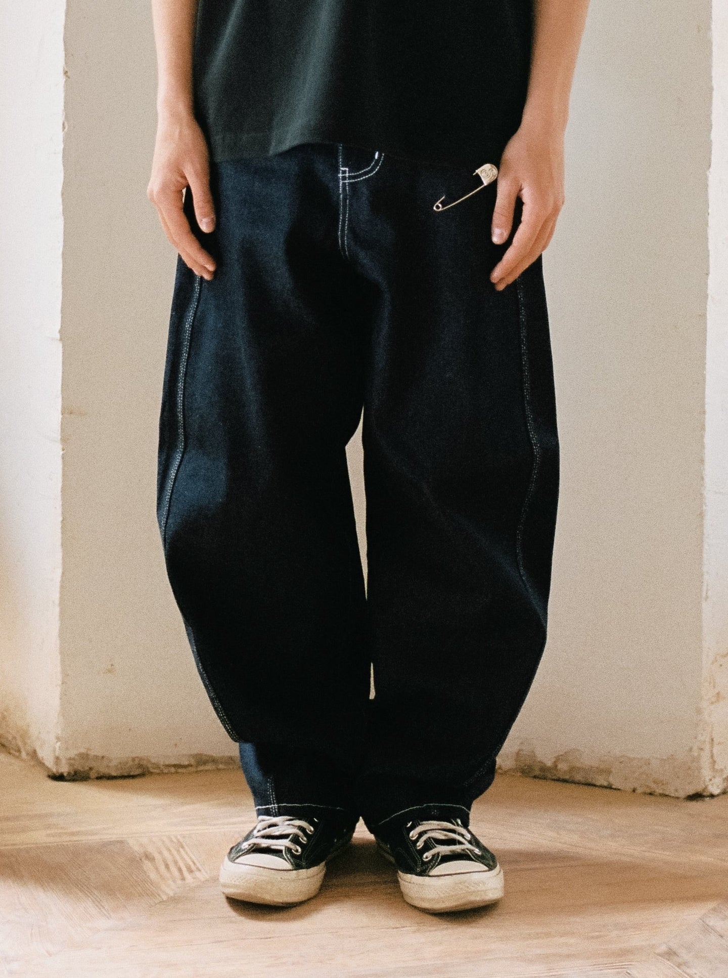 TWISTED SEAM DENIM PANTS